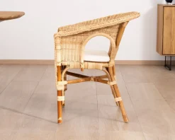 Elégant petit fauteuil en rotin tressé avec assise tissu 