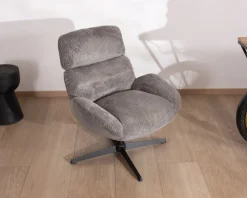 Fauteuil rétro en tissu gris et pied pivotant en métal noir 
