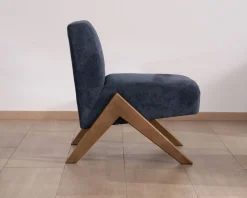 Fauteuil rétro tissu bleu foncé avec pieds bois boomerang 