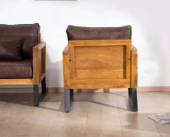 Fauteuil style club en teck et tissu aspect cuir "Roster"