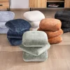 Pouf « Flow » tournant à trois niveaux en tissu tramé gris anthracite au toucher doux