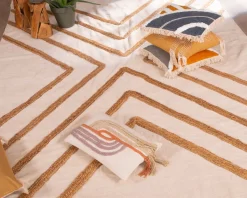 Tapis beige en coton orné de jute tressée 120 x 180 cm 